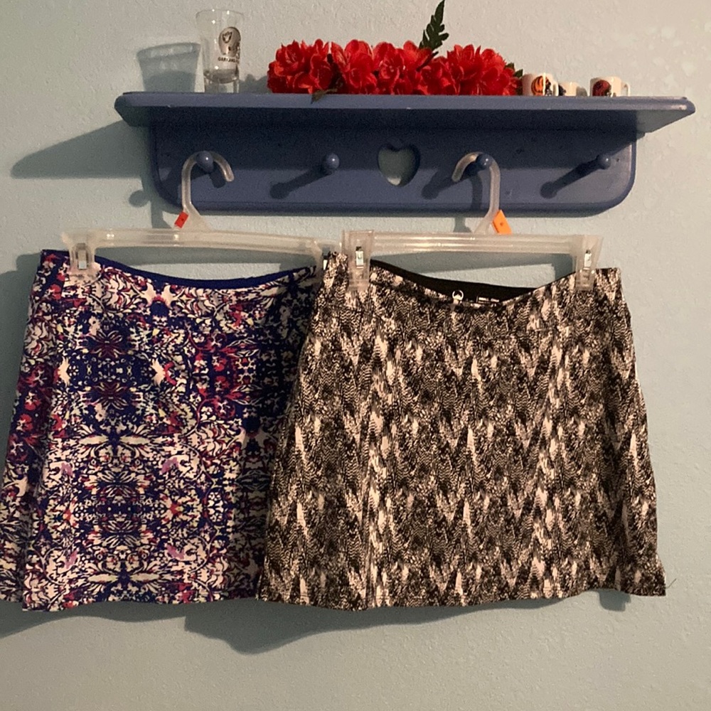 Tranquility skirts. Blue red an white, 2nd skort is black and white size small.